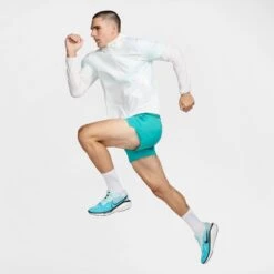 Nike Men's DRI-FIT Stride 7" Shorts (345 - Dusty Cactus/Black/Reflective Silver) -TCRunning Shop AURORA DM4761 345 PHSYM005 2000