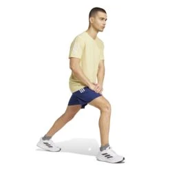 ADIDAS Men's OTR Base Tee (Powder Yellow) -TCRunning Shop JC9791 4 APPAREL On Model Walking View white